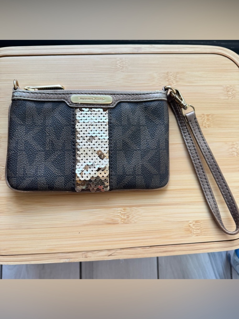 Michael Kors Brown Wristlet with Gold Sequin Accent